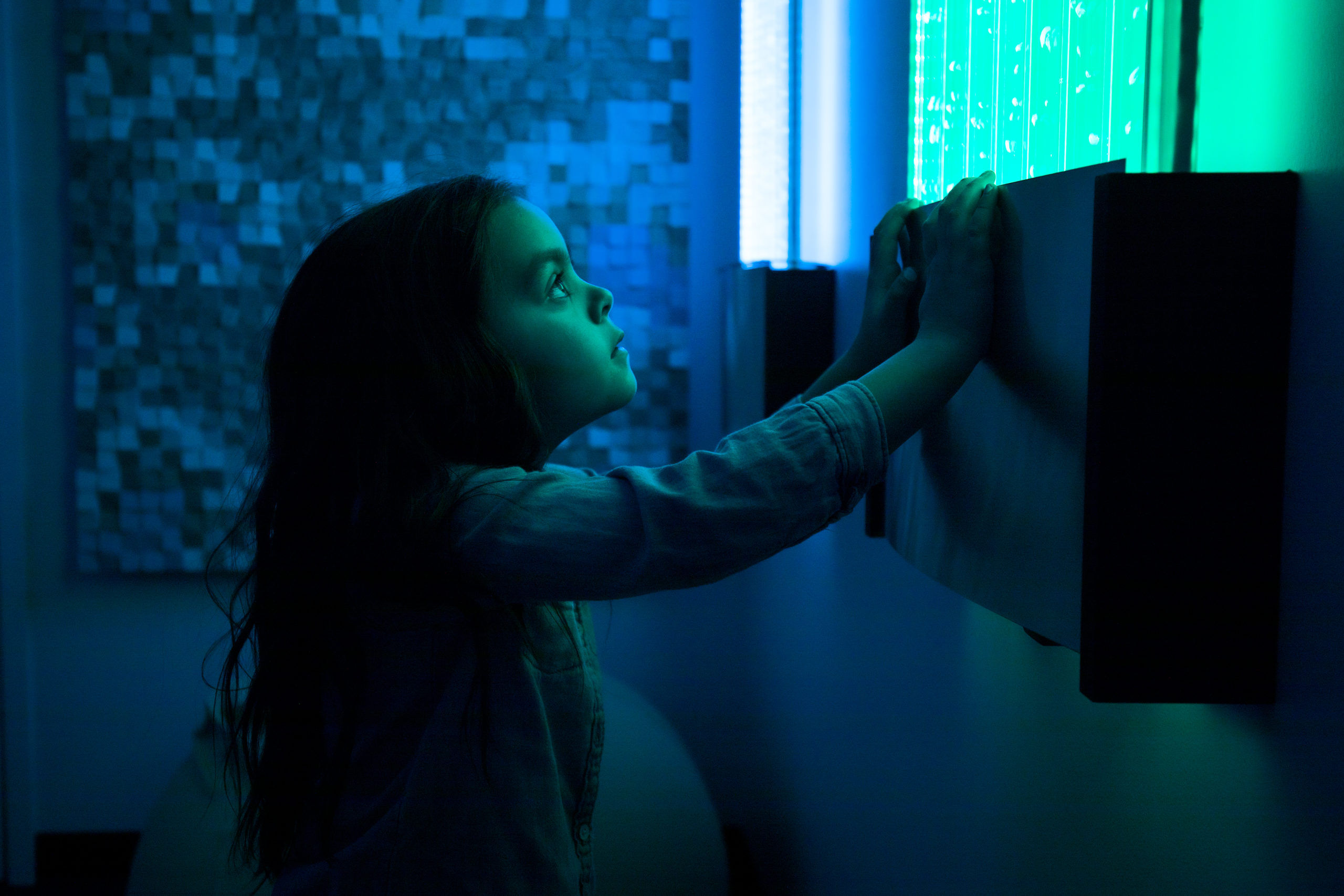 A child uses a sensory room, safe with the help of Corporate event security
