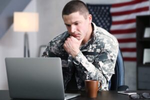 A solider examines an Intrusion Prevention System